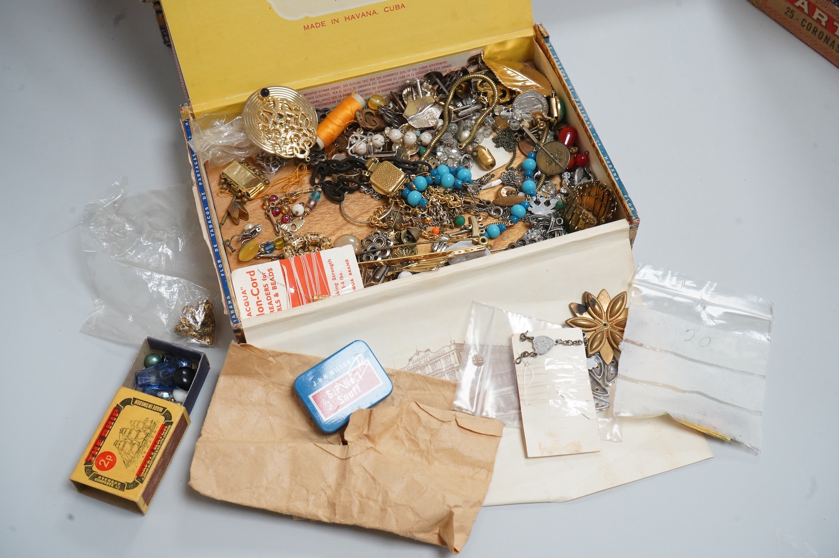 A group of assorted costume jewellery, glass beads etc.